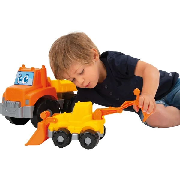 Camion et chargeur avec lame